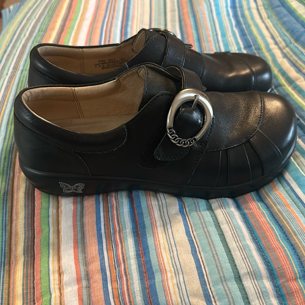 Alegria  leather black slip on shoes. Size 38. In good used condition.